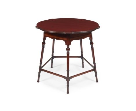 MANNER OF MORRIS &amp; COMPANY  ARTS &amp; CRAFTS MAHOGANY CENTRE TABLE, CIRCA 1890   the shaped circular top raised above an