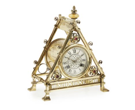 BRUCE JAMES TALBERT (1838-1881) FOR HART, SON, PEARD &amp; CO.  GOTHIC REVIVAL BRASS MANTEL CLOCK, CIRCA 1870   the twin trai