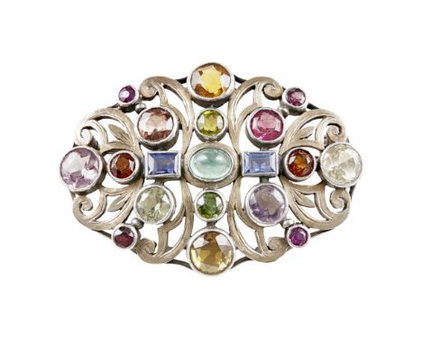 [§] SIBYL DUNLOP (1889-1968)  ARTS &amp; CRAFTS SILVER AND GEM SET BROOCH, LONDON 1965   of oval outline, the scrolling openw