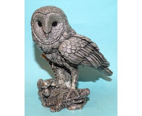 A silver model of a barn owl signed 'Langford', Birmingham 1996, 9.5cm, (filled). 