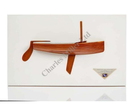 A 1:16 SCALE HALF-BLOCK PRESENTATION MODEL OF THE 12FT RESTRICTED CLASS DROP-KEEL DINGHY FLIP MCGILDA [1946], the hull carved