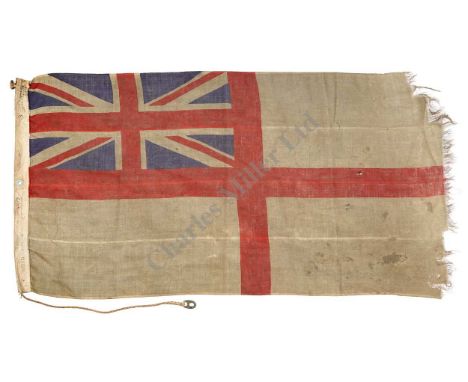 AN HISTORICALLY INTERESTING WHITE ENSIGN, BELIEVED TO BE THE FIRST ALLIED FLAG RAISED ON 'SWORD' BEACH DURING THE ALLIED D-DA