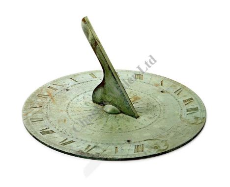 A RARE 20½IN. BRASS SUNDIAL BY THOMAS JONES, LONDON, CIRCA 1830, with finely engraved compass rose around gnomon and foliate 