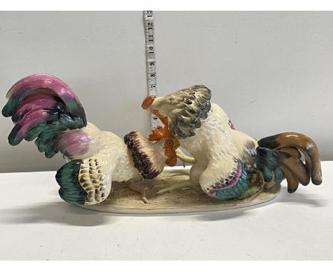 A Dresden style ceramic fighting cock scene L55x27cm, shipping unavailable