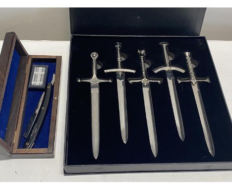 A cased set of Game of Thrones novelty swords and a new Murdoch cut throat razor (UK shipping only)