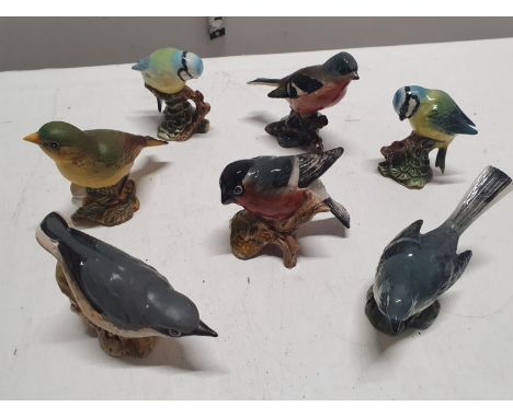 Seven Beswick ceramic bird figures, shipping unavailable