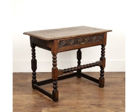 Oak carved lowboy19th Century, with bobbin supports, 87cm wide x 50cm deep x 67cm high  Considerable marks, wear and some old