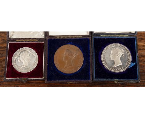 Three prize medalsnamed to Theophilus Watkins, Science and Art Department, silver and bronze medals, 45mm by W Wyon, silver m