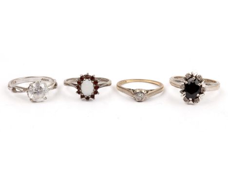 Collection of four rings comprising an 18ct white gold cluster ring, size O/P, 6g approx overall, an 18ct gold solitaire ring