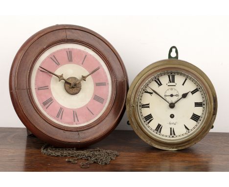 Sestrel ships bulkhead clock in brass case, the dial with Roman numerals and a Black Forest postman's alarm clock in mahogany