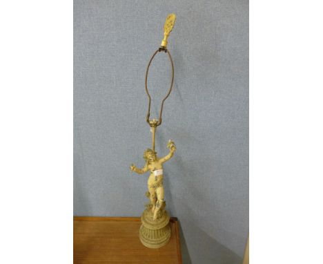 A figural table lamp 