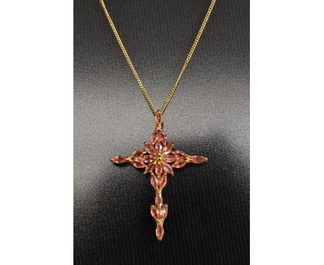 A Gems Tv ceylon padparadscha pink stone possibly sapphire floral cross pendant necklace, 18ct gold mount, suspended from an 