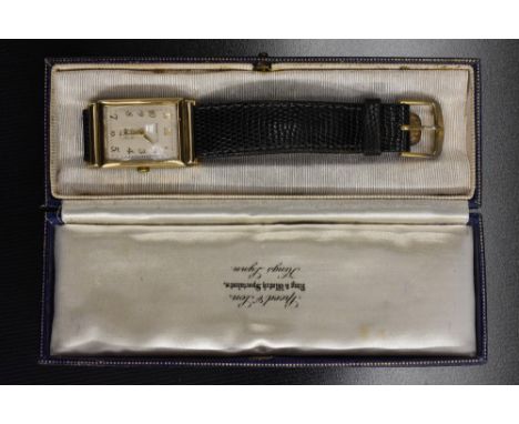 Movado for Tiffany & Co  - a vintage 14k gold tank cased wristwatch,creamy grey dial, raised gilt Arabic numerals, minute tra