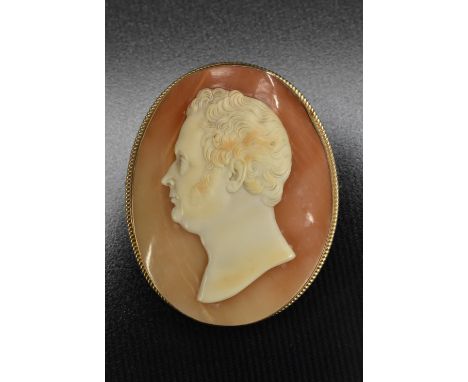 A Victorian carved shell cameo, portrait of a distinguished gentleman, later mounted as a brooch, 9ct gold frame, Birmingham 