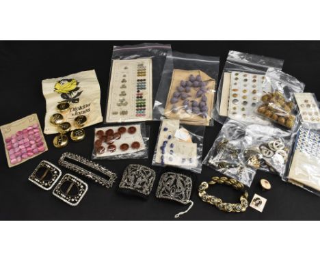 A quantity of late 19th century and later buttons and buckles, some on original cards, to include enamel style, glass, cut st
