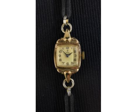 Tudor Rolex - a vintage lady's 9ct gold cased bracelet watch, cream cushion dial, Arabic numerals, blued hands, manual wind 1