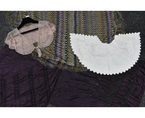 A 1920s beaded and embroidered net shawl, fan design on salmon pimk, scalloped edge, tie front; a long purple silk shawl, pul