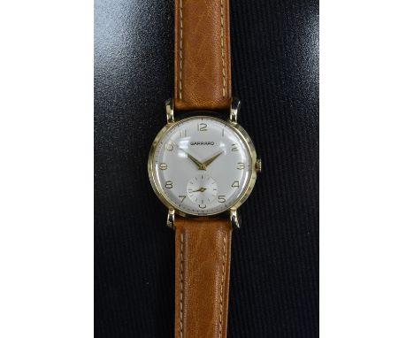 Garrard  - a vintage 1960s gentleman's wristwatch,  textured silver dial, Arabic numerals, minute track, subsidiary seconds, 