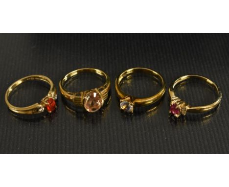 A Gems Tv ruby and diamond ring;  others sunstone, cz etc, all  9ct gold shanks, 9.9g gross, part with certificates (4) 