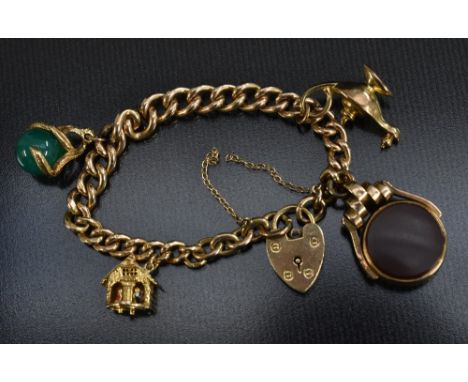 A 9ct rose gold graduated curb link Albert chain bracelet, with heart shaped padlock, suspending a bloodstone and carnelian i