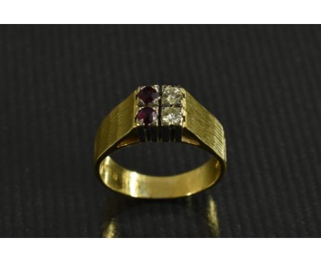 a diamond and ruby quartetto ring, inset with a pair of diamonds and a pair of rubies, textured shoulders, 18ct gold shank, s