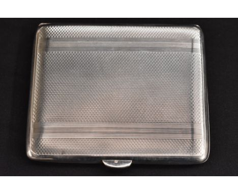 A George V silver cigarette case, engine turned and linear decorated exterior, Frederick Field, Birmingham 1920, 98mm long, 8