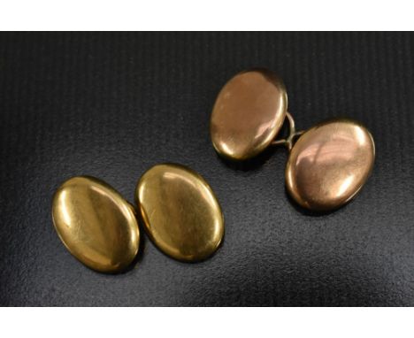 A pair of 18ct gold cufflinks, each terminal as a smooth domed oval panel, stamped SS 18k, 5.9g gross (2)
