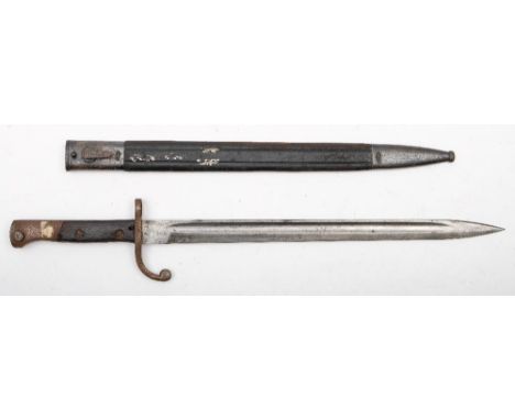 A WWI German bayonet:, the straight single edge fullered blade with single quillon and two piece wooden grip, together with a