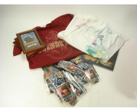 A group of Harry Potter collectables distributed by Odeon cinemas:, including two t-shirts, scarves, colouring pencils, postc