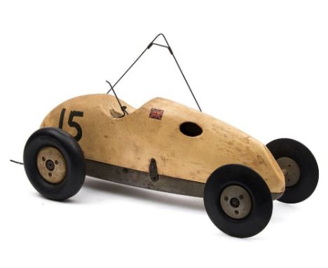 A tethered  model racing car circa 1950s:, the white painted wooden body with Union Jack transfer and numbered '15' on an alu