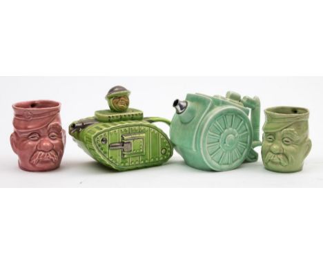 A Saddler 'Churchill' tank teapot:, in green with silver lustre highlights, together with a Grimwades 'Belisha' field gun tea