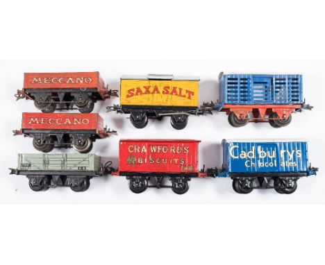 Hornby O gauge, a group of seven goods/private owner  vans:, 'Crawford's Biscuits', 'Cadbury's Chocolates', 'Saxa Salt', two 