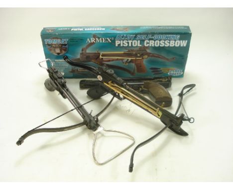 An Armex 'Tomcat' pistol crossbow:, unopened in box, together with two other crossbow pistols, a Daisy Powerline 717 air pist