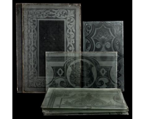 A group of thirteen early 20th century acid etched glass public house window panels by M Dunn, West Bromwich:, comprising ele