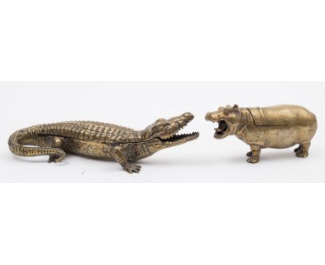 An early 20th century Austrian brass hippopotamus inkwell:, the hinged back revealing two apertures for wells, traces of  ori