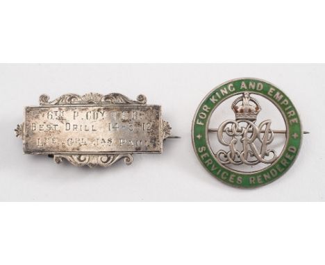 A George V green enamelled wound badge:, inscribed to the reverse ''Lce, Cpl R Shepherd 1857  1/5th Devon Rgt' and numbered 9