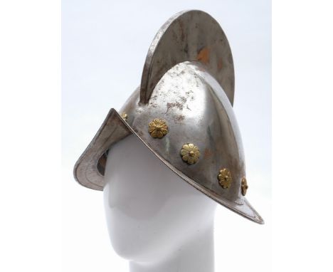 A reproduction Spanish morion helmet:,  20th century with high comb, plume holder, floral brass studs and  broad rim 27cm hig