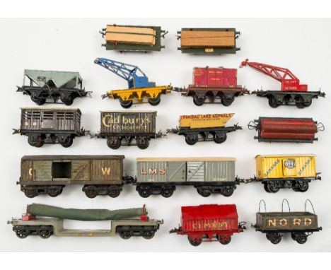 Hornby O gauge a group of goods wagons:, 'Fyffes' banana van, rotary tipping wagon, two crane trucks, two lumber wagons, a ho