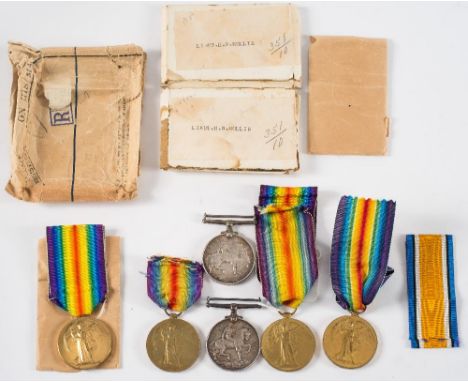 Two   WWI pairs '9/8493 Pte C E Lawrence The Queens R':, and '209935 Dvr E Cox RA', together with two Victory Medals, 'Lieut 