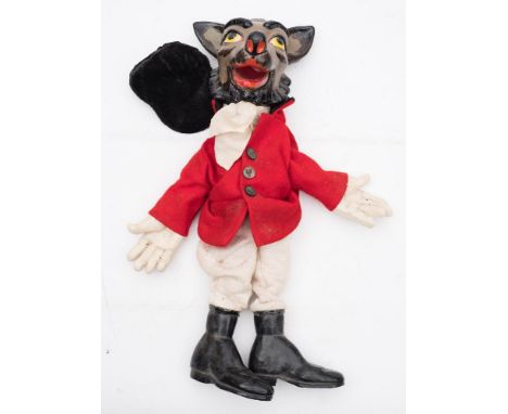 A Pelham style puppet of an anthropomorphic fox wearing hunting pinks:,  painted wooden head with articulated jaw, 45cm high.
