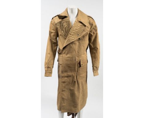 A WWII  British Army dispatch rider's canvas overcoat by the Manchester Clothing Company:, size 8, stamped with War Departmen