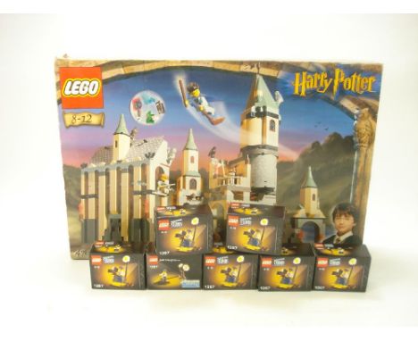 Lego 'Harry Potter' set 4709:, together with seven boxed Lego 'Studios' cameraman figure No 1357 (8)  (set 4709 unchecked for
