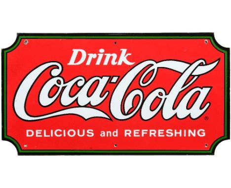 A late 20th century Coca-Cola enamel advertising sign:, circa 1970s, the central logo surrounded by a green and black border,