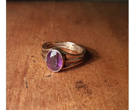 George V 9ct gold and amethyst ring by Smith &amp; Bartlam, oval faceted stone approx 1.5ct, good guage three strand shank un