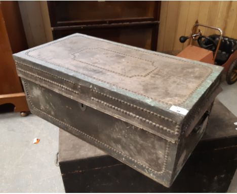 19th Century studded leather and metal mounted two handled trunk, 65cm x 34cm x 26cm high, slight damage and corrosion to met