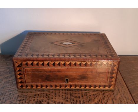 Victorian figured walnut, parquetry banded and mother of pearl inset Games box, lined and fitted interior containing two bezi