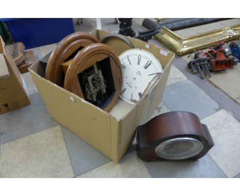 Two clock cases/movements, assorted dials and a mantel clock 