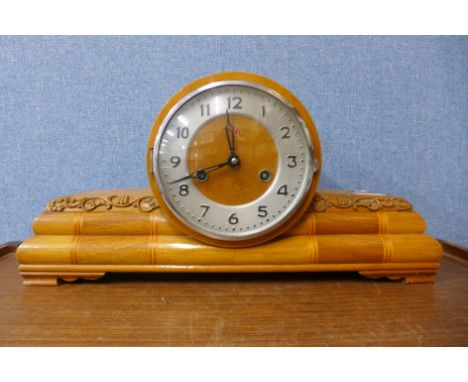 A walnut 15 day mantel clock 