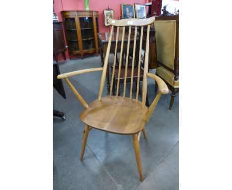 An Ercol Blonde armchair 