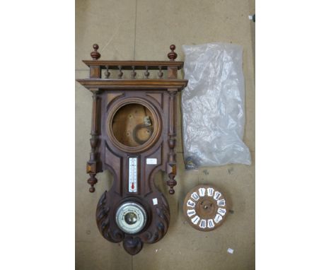 A 19th Century French carved beech wall clock and barometer 